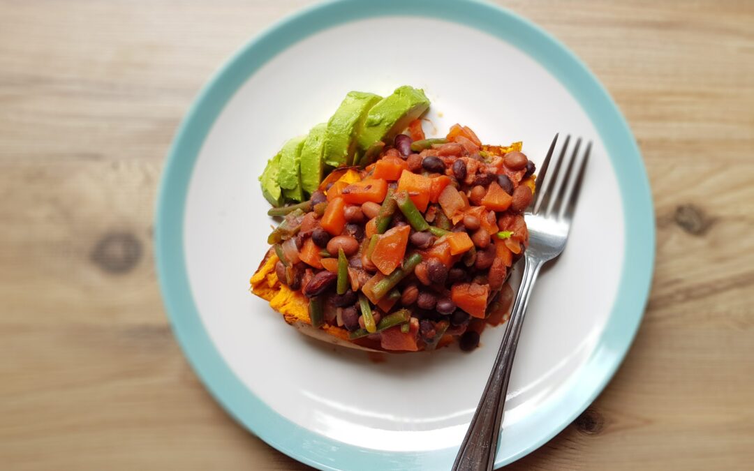 Baked sweet potato and chipotle beans