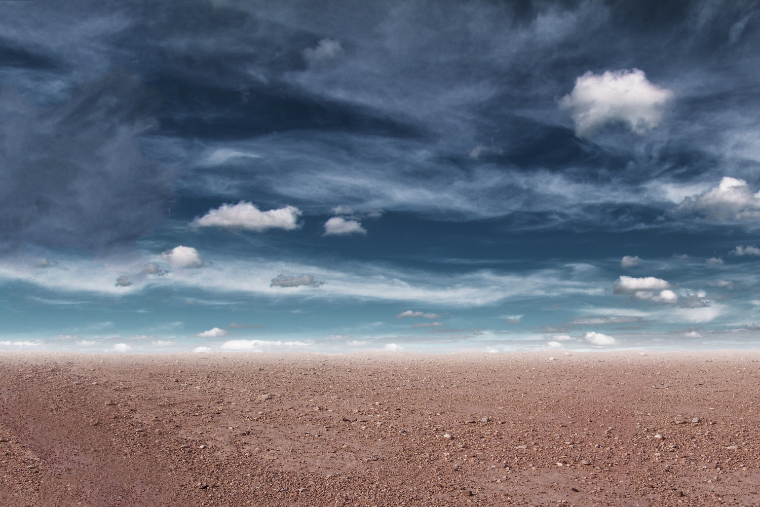 desert soils under a blue sky